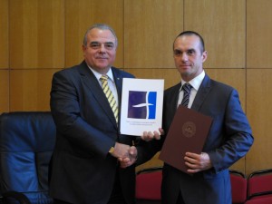 Prof. Dr. Statty Stattev, UNWE Rector, (on the left) and Rossen Nikolov, BDIF Chairman, after signing the Memorandum